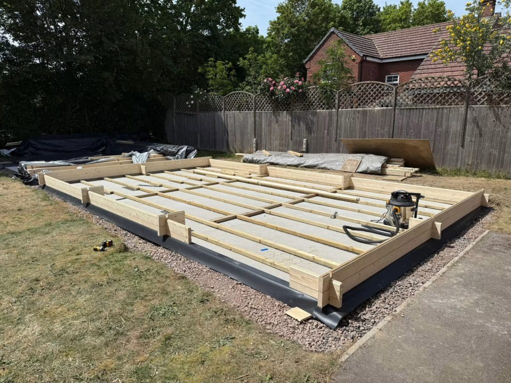 A wooden base for the workshop shed